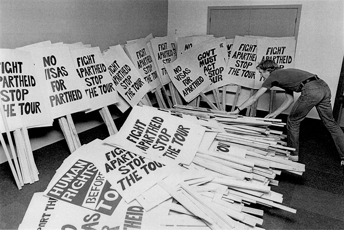 Geoffrey Walker arranging placards for use during an anti-Springbok tour demonstration in Wellington 1981